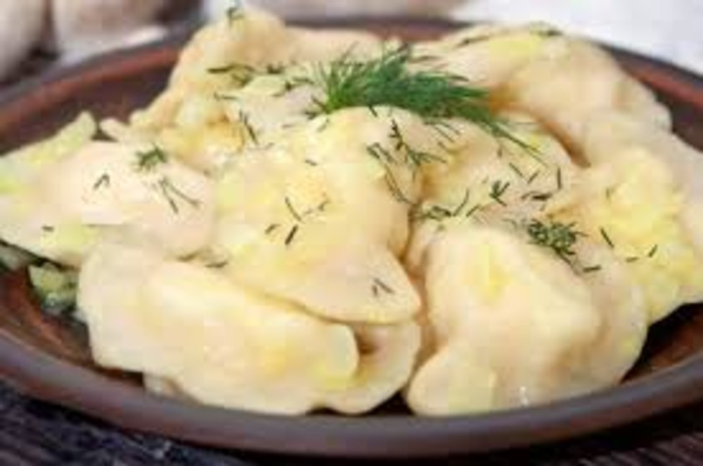Вареники з картоплею та маслом вершковим