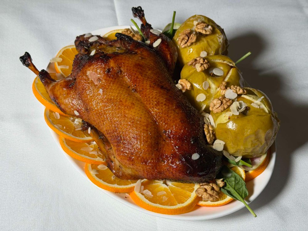 Качка запечена з яблуками