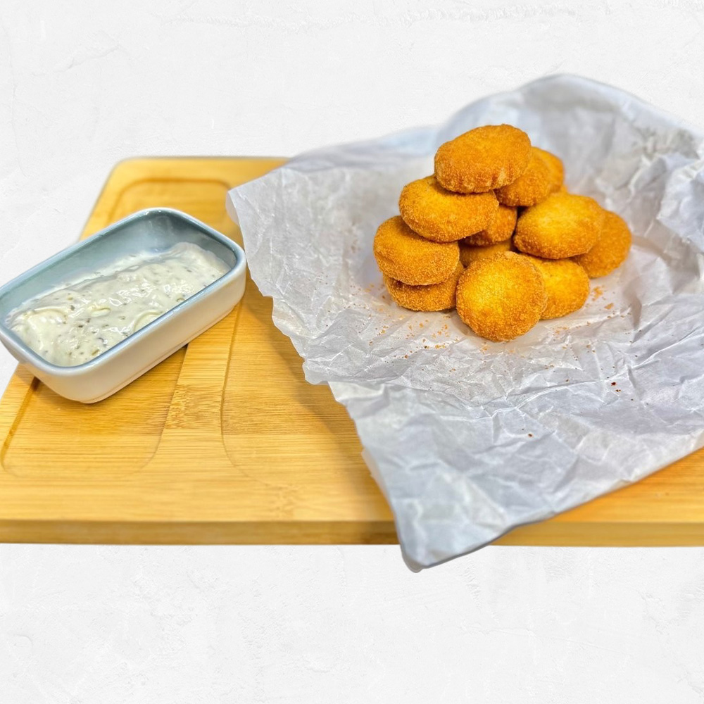 Нагетси з часниковим соусом