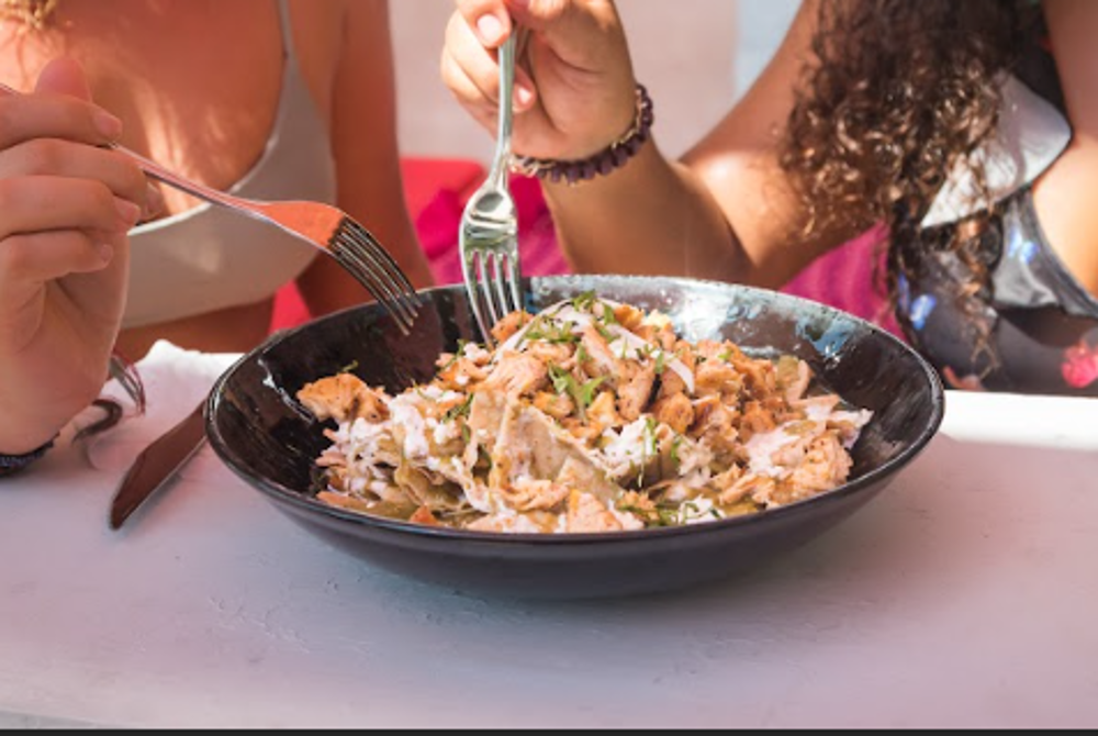 Chilaquiles salsa del día INCLUIDO