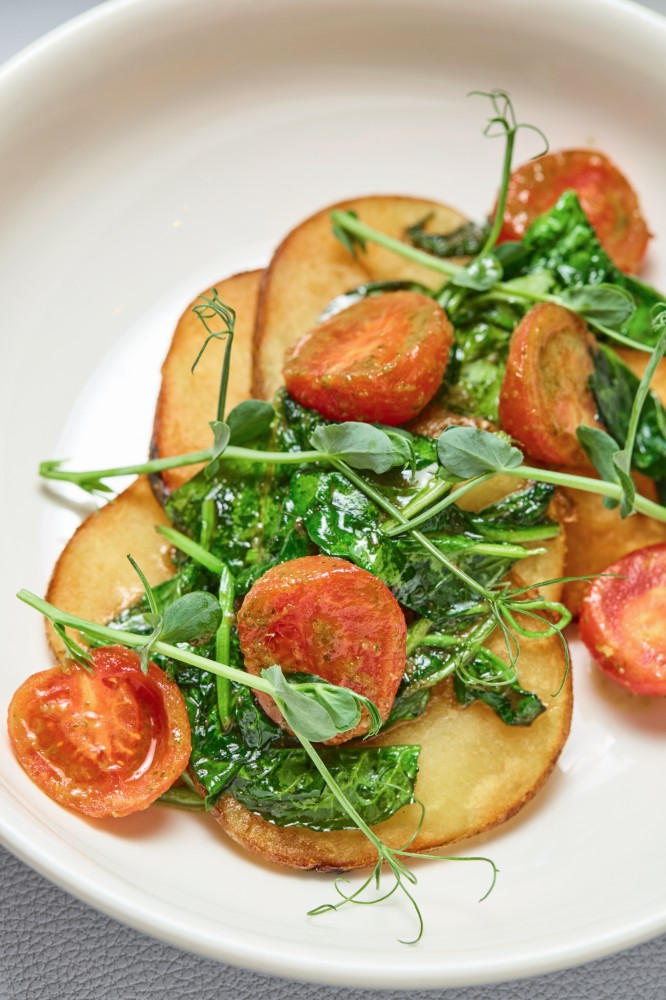 Картопля зі шпинатом та томатами