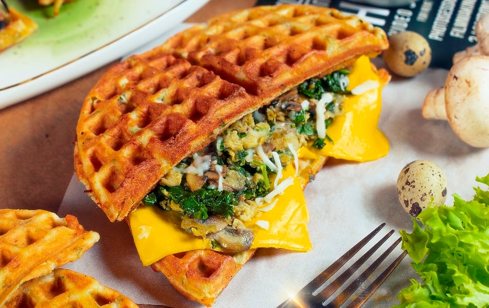 Waffle sandwich with scramble, mushrooms