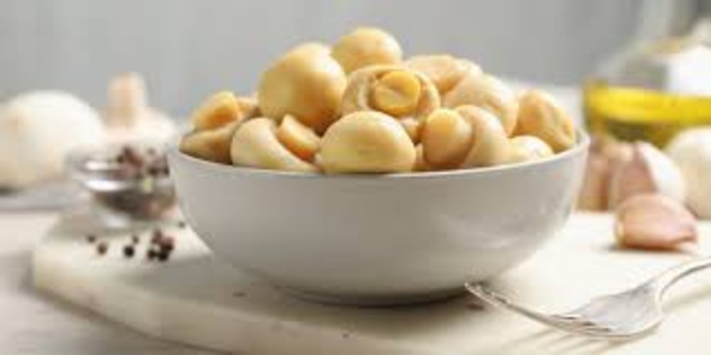 Мариновані шампіньйони (100 гр)