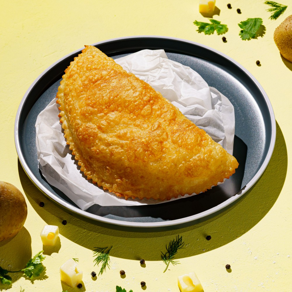 Cheburek with potatoes with cheese