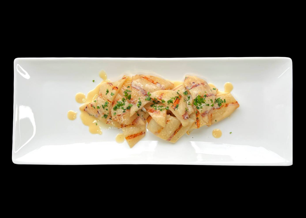 Кальмар у вершковому соусі (210г)