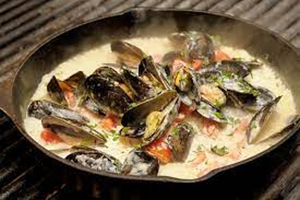 Мідії у вершковому соусі