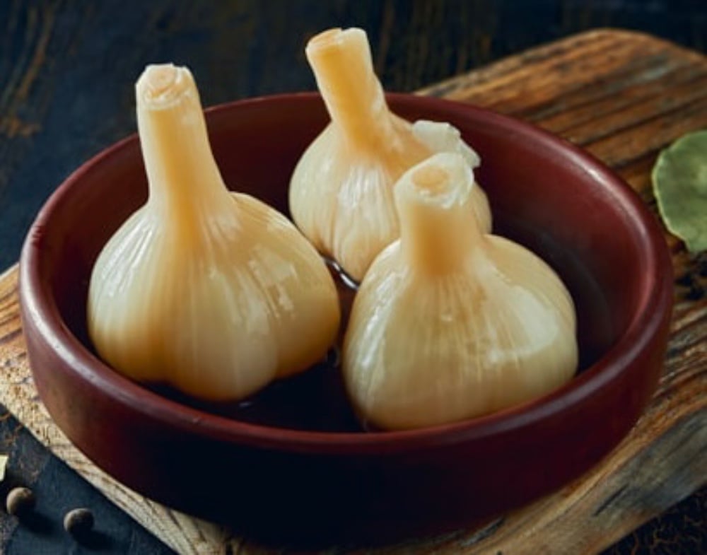 Соління часник маринований