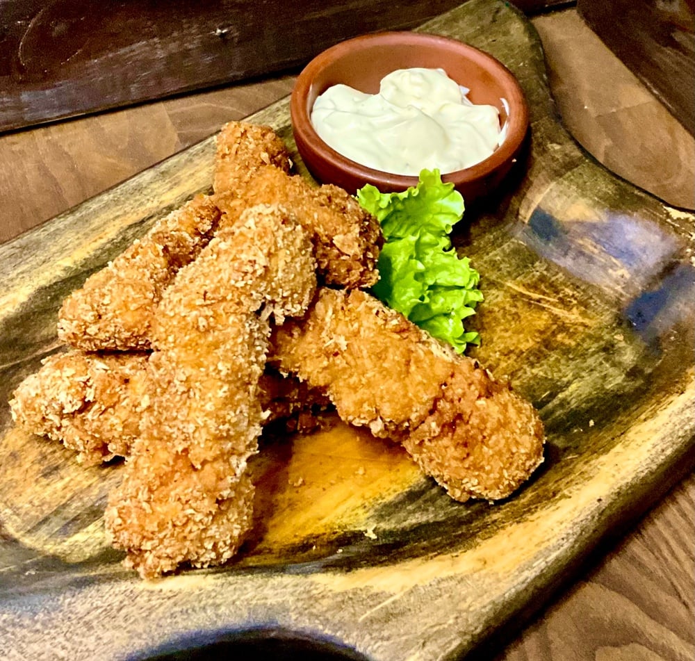 Нагетси с білим соусом