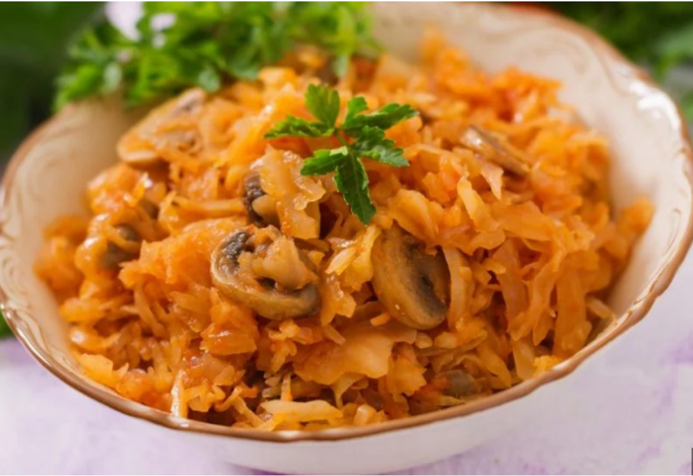 Капуста тушена з грибами(достака)