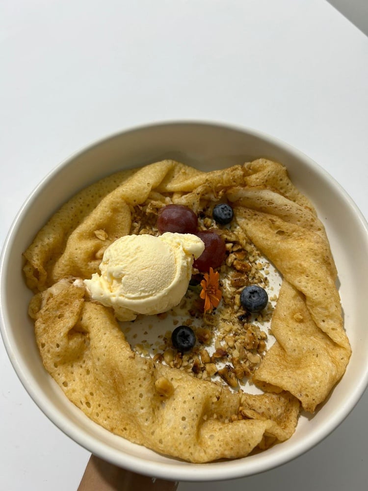Crepes with Scoop of Vanilla Ice Cream and Walnuts 