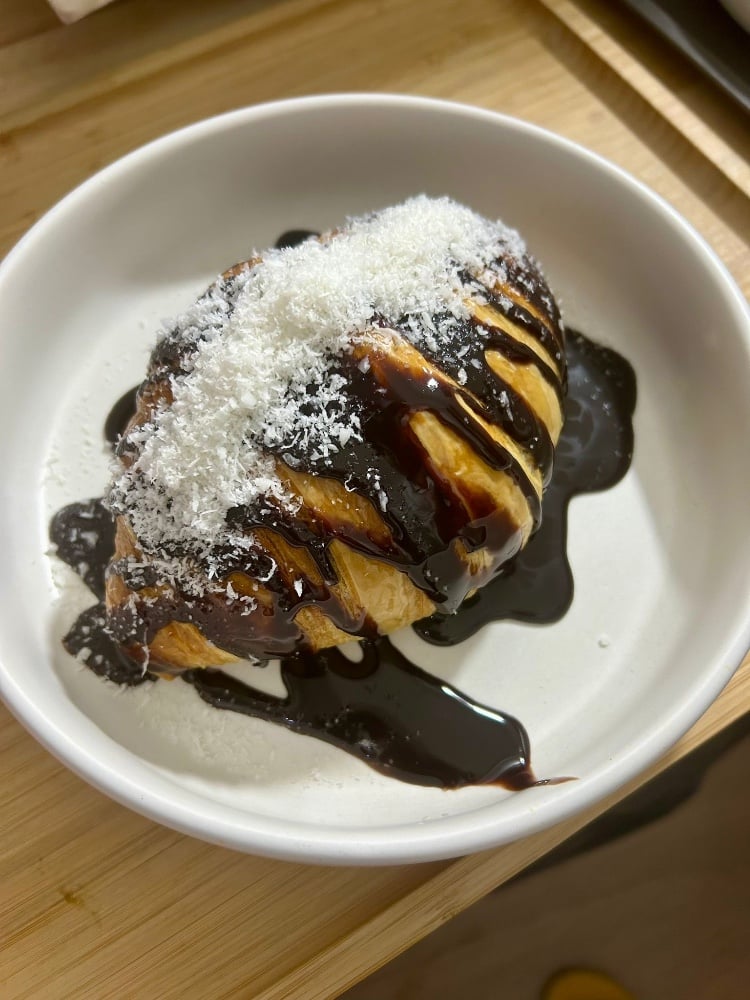 Croissant with chocolate and coconut 