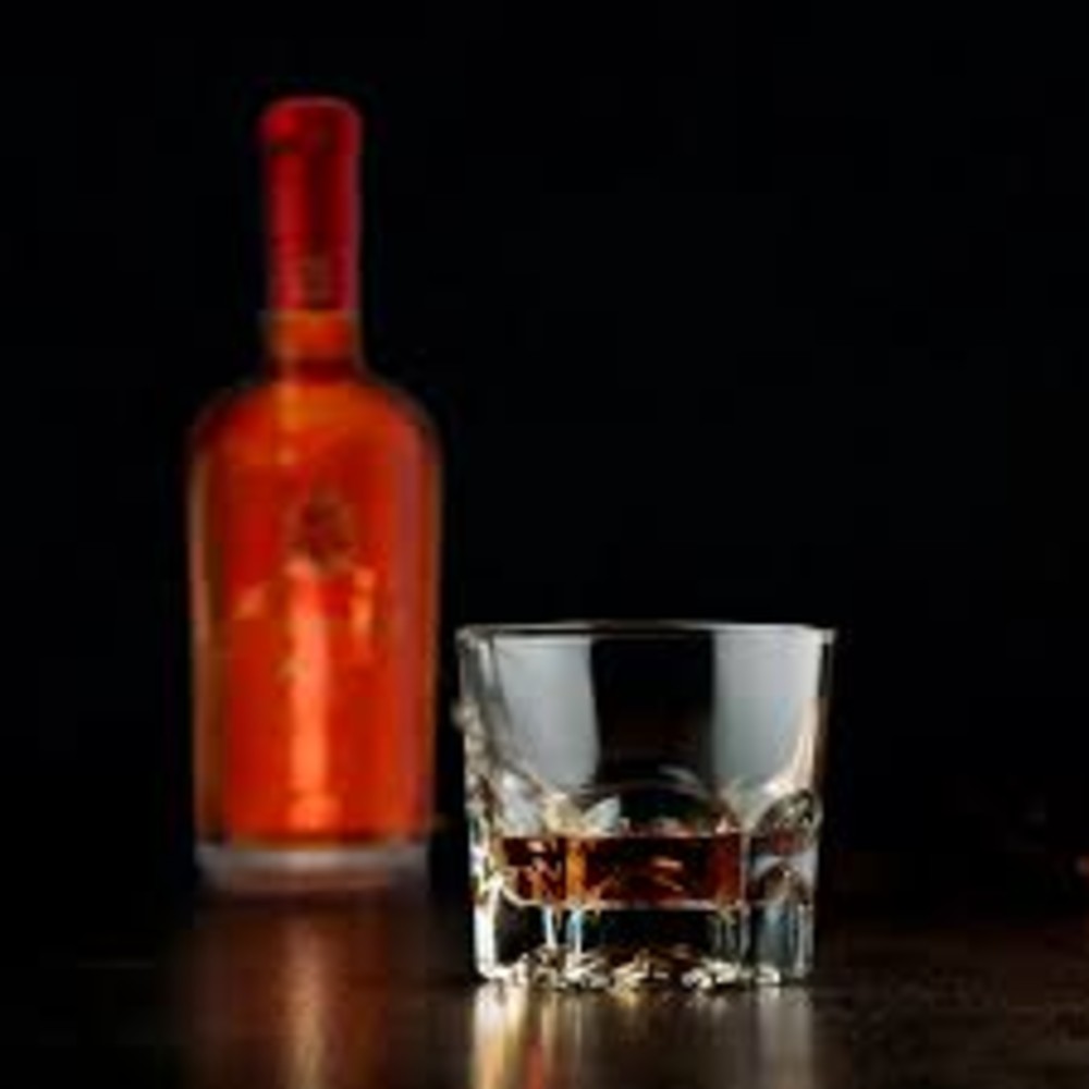 Trago Botella Brandy Regido