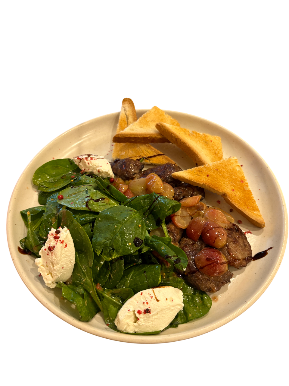 Теплий салат з печінкою, виноградом та шпинатом