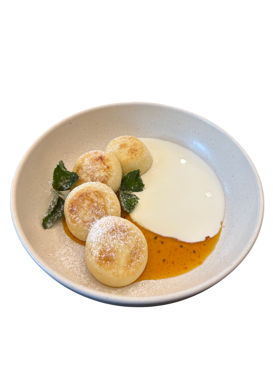 Сирники зі сметаною та обліпиховим соусом