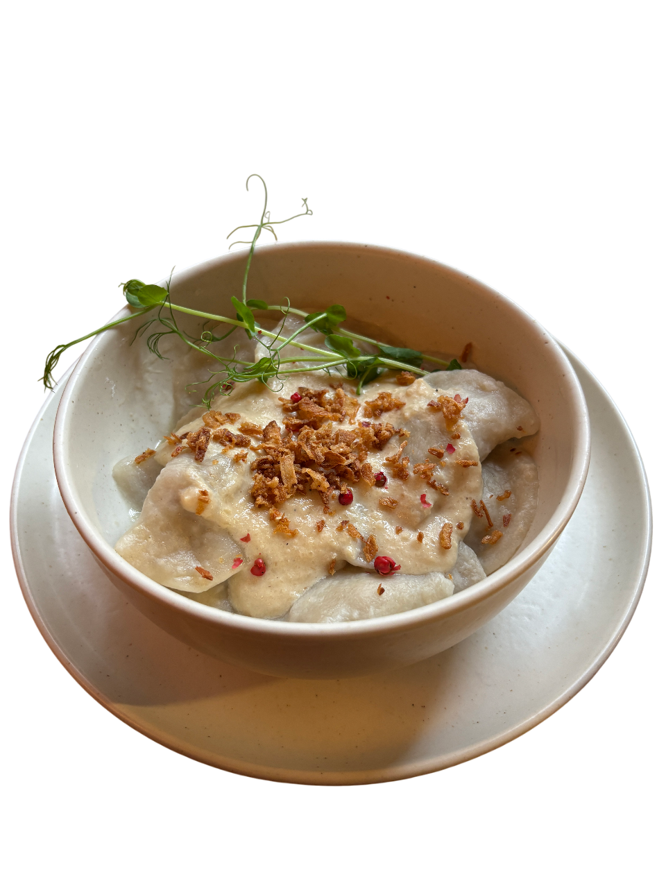 Вареники з м'ясом та вершково-цибулевим соусом