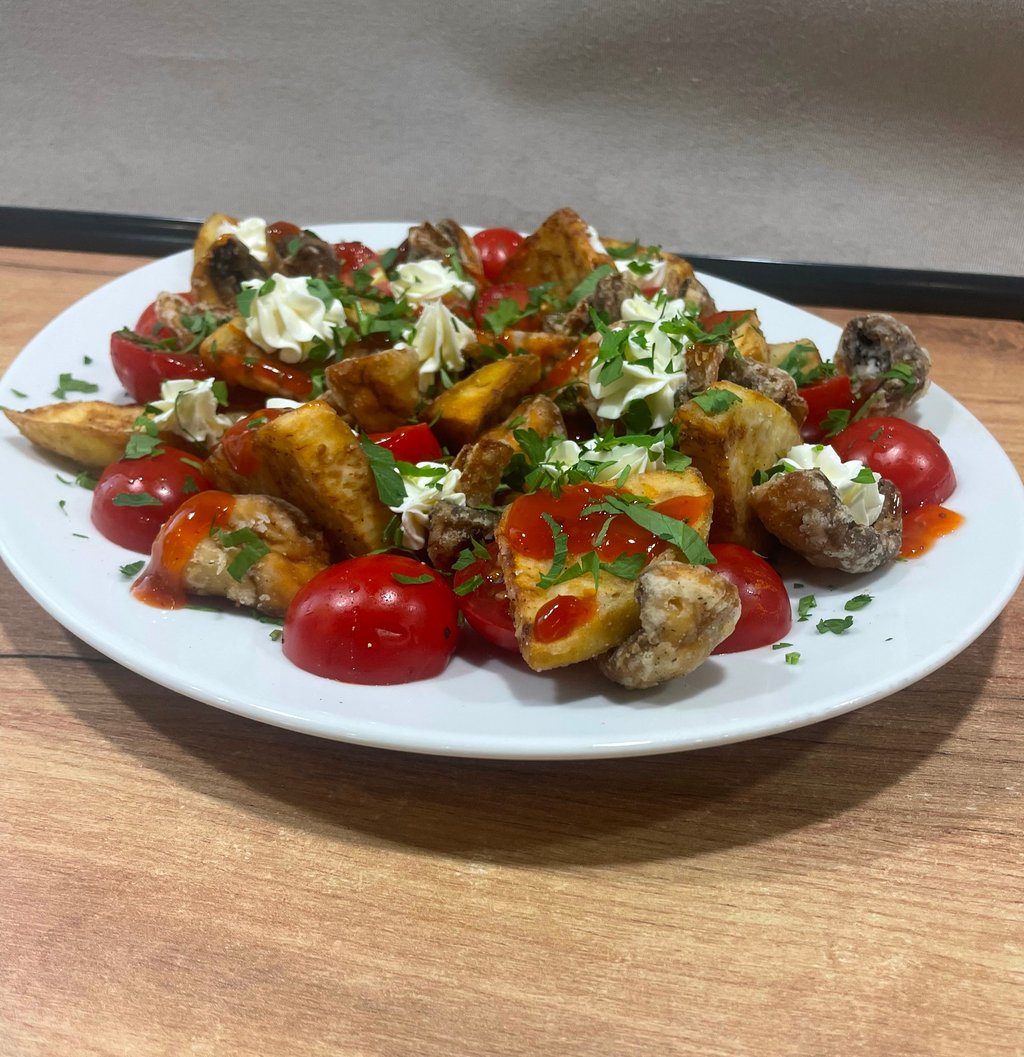 Баклажан з томатами та грибами