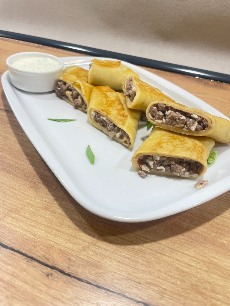 Млинці з яловичиною