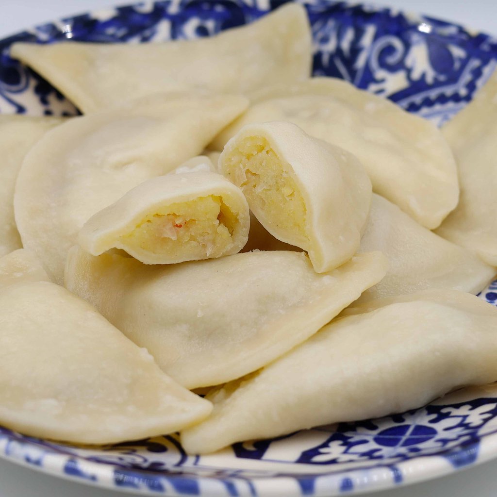 ВАРЕНИКИ З КАРТОПЛЕЮ ТА КВАШЕНОЮ КАПУСТОЮ | ціна за 100 г (на вагу)