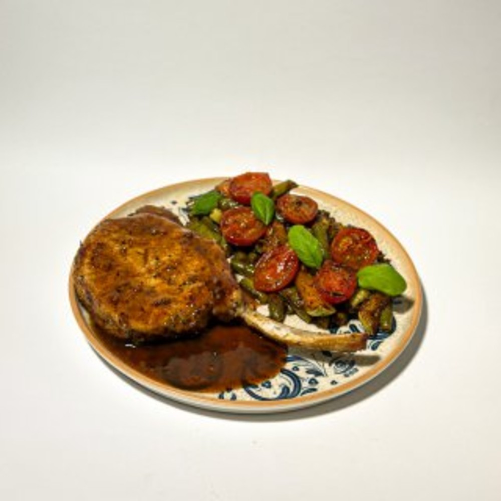 Стейк зі свинини на кістці / Pork steak on the bone