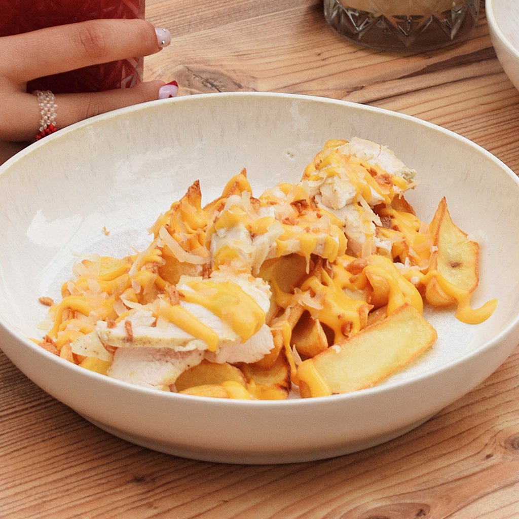 Курка з картофельными діпами та сирним соусом