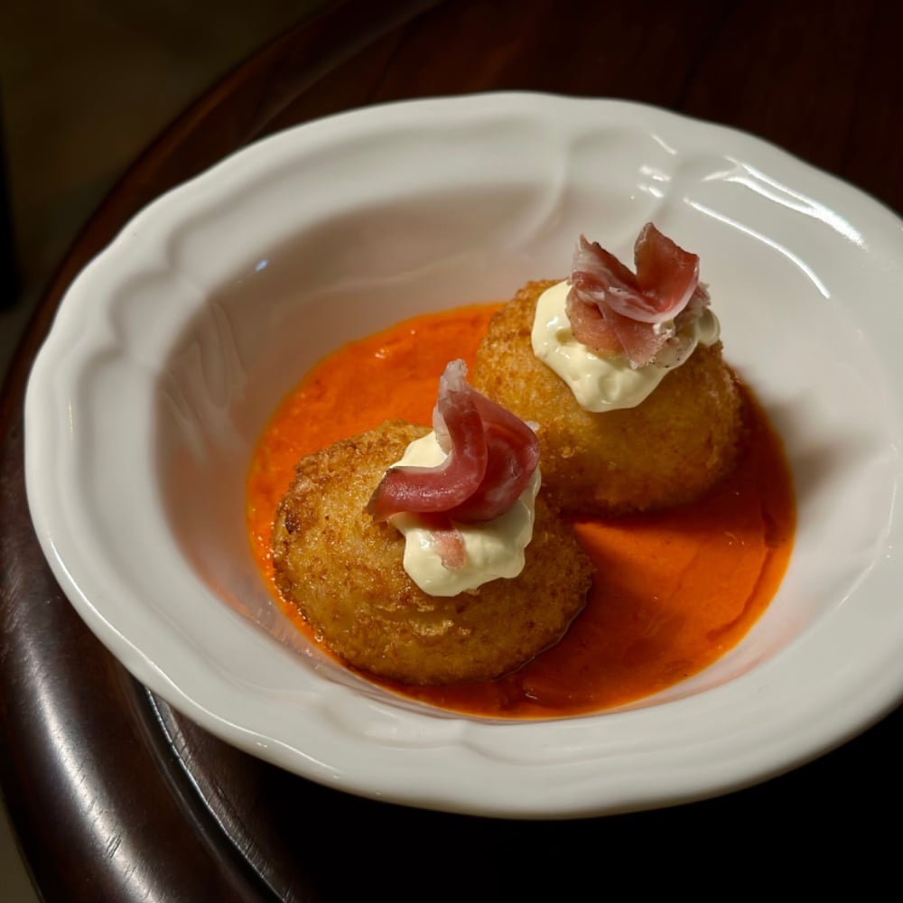 Croquettes with ham and romesco sauce f
