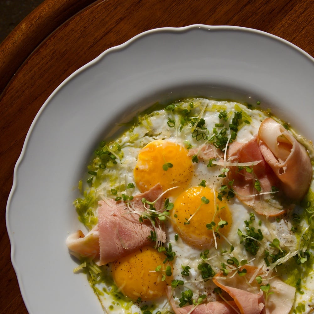 Fried potato with eggs and ham