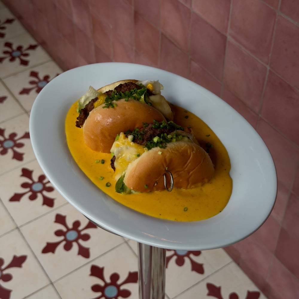Cheeseburger in cheesy bath 