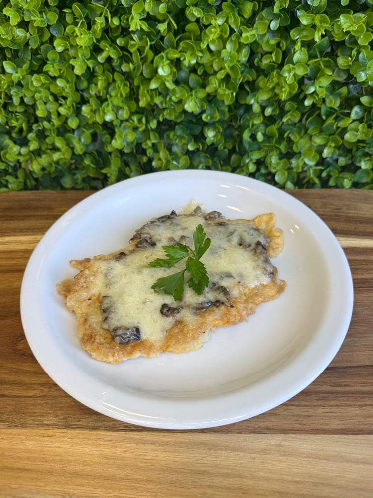 Ескалоп свинний з грибами та сиром