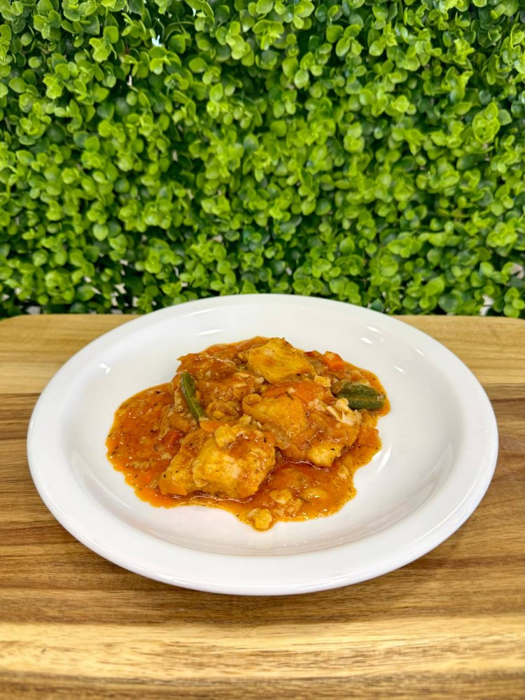 Хек в томаті 