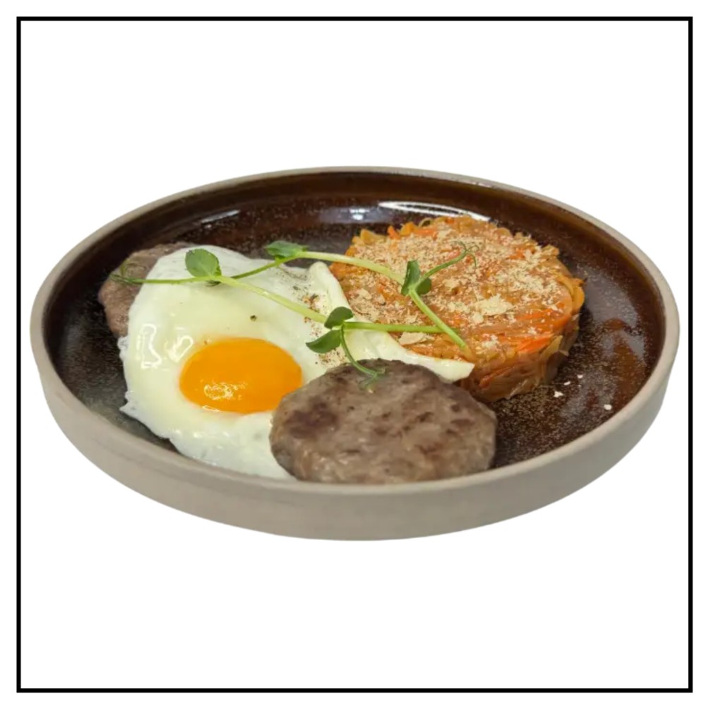 Біфштекс з  тушеною капустою 