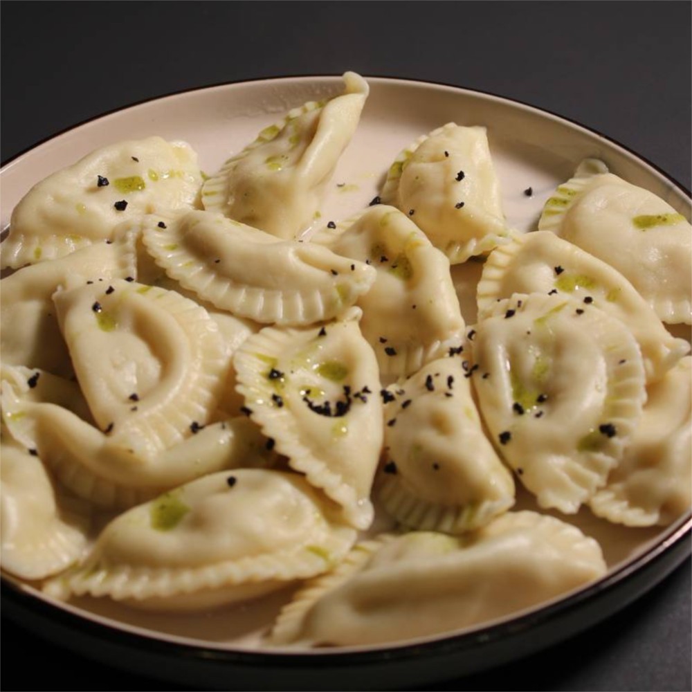 Вареники з творогом.