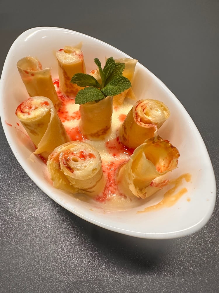 МЛИНЦІ З СИРОМ, ЗАПЕЧЕНІ У ВЕРШКОВОМУ СОУСІ