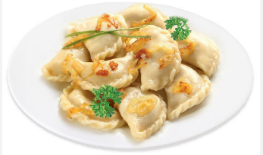 Вареники з картоплею і грибами та сметаною