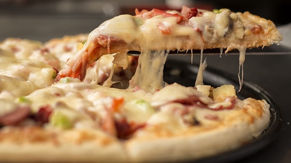 PIZZA PROSCIUTTO Y RUCULA