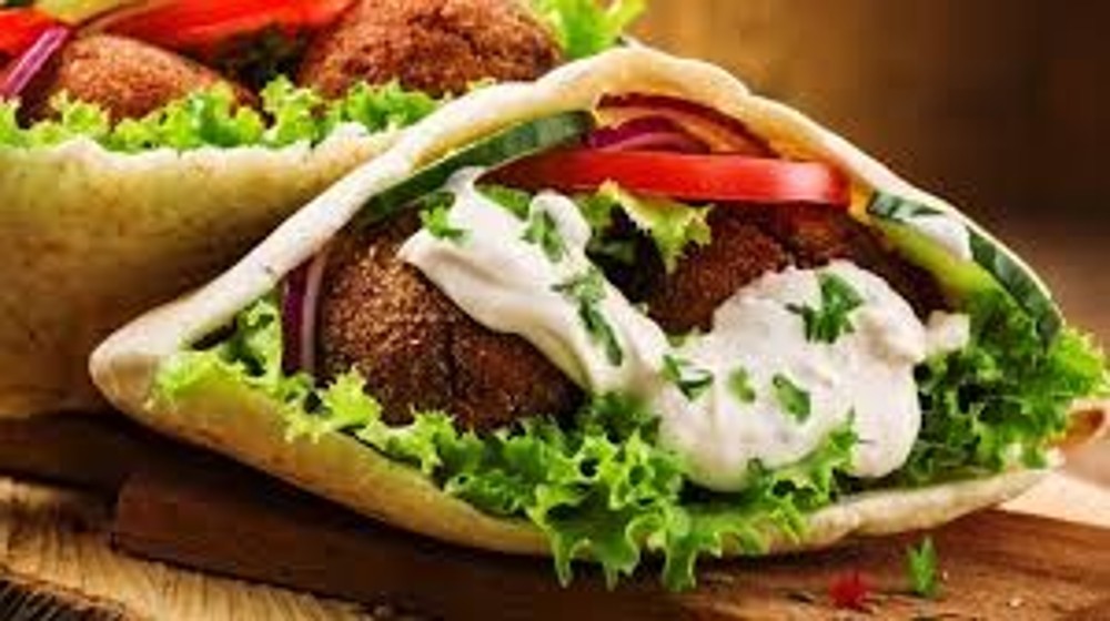 Вега-2 ,300 г(фалафель, капуста маринована, морква,цибуля,сир,картопля фрі, шампіньйони, соуси на вибір,тортіла)