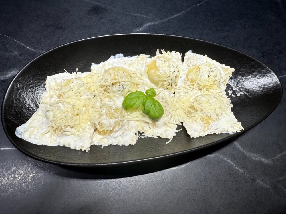 Равіолі з шпинатом,лососем та рікоттою, порц.