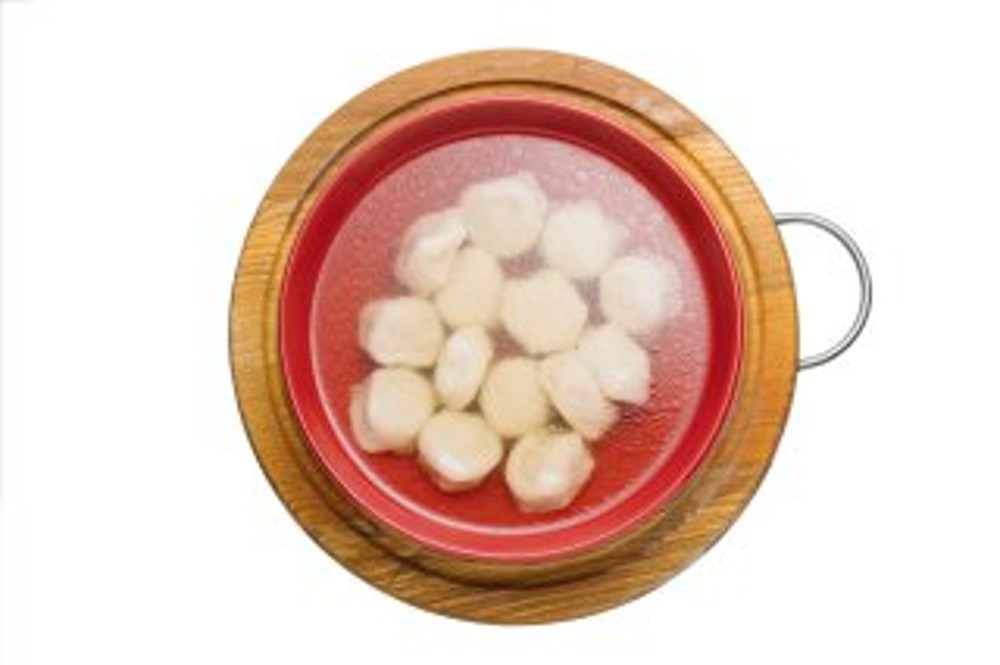 Пельмені з бульйоном