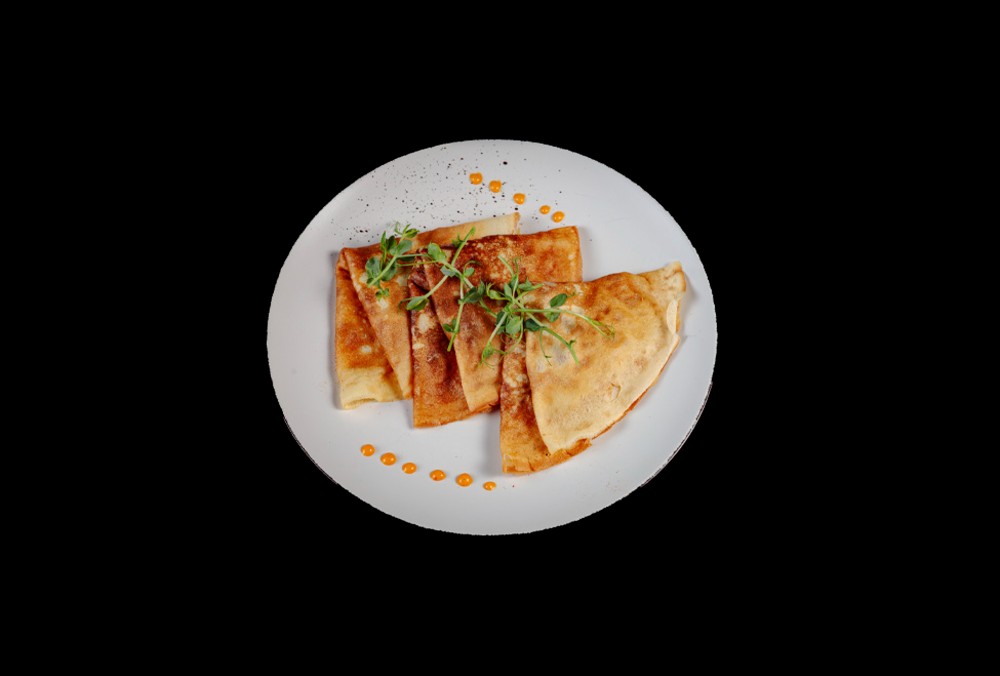 Млинці з куркою та грибами у вершковому соусі