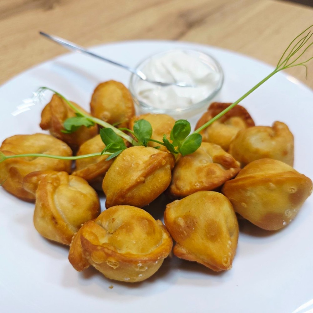 Смажені пельмені зі свинини та яловичини