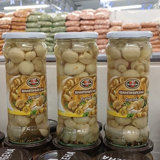 Шампіньйони "Особливі" мариновані цілі скло ЧЕМПІОН (Павловський) 580г