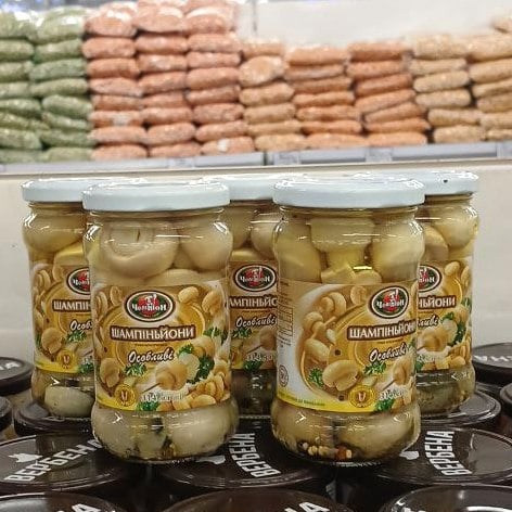 Шампіньйони "Особливі" мариновані цілі скло ЧЕМПІОН (Павловський) 314г