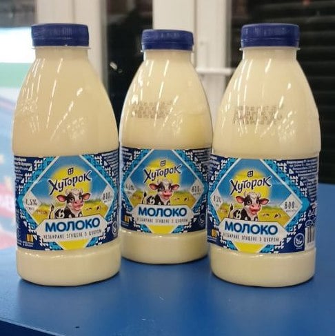Молоко незбиране згущене з цукром 8.5% жиру ТМ Хуторок (The Banka) 800г