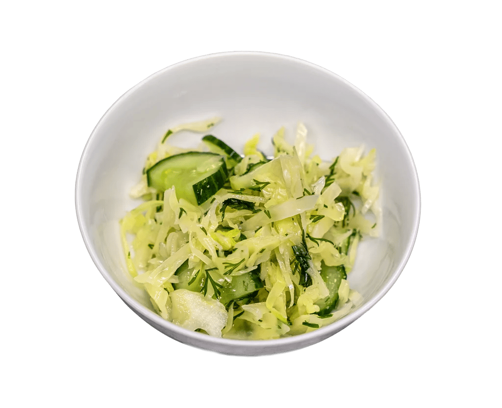 Салат з капустою та огірком