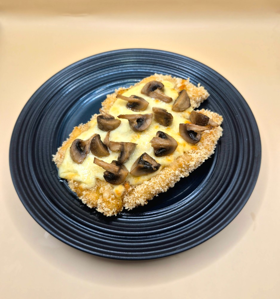 Шніцель курячий з грибами