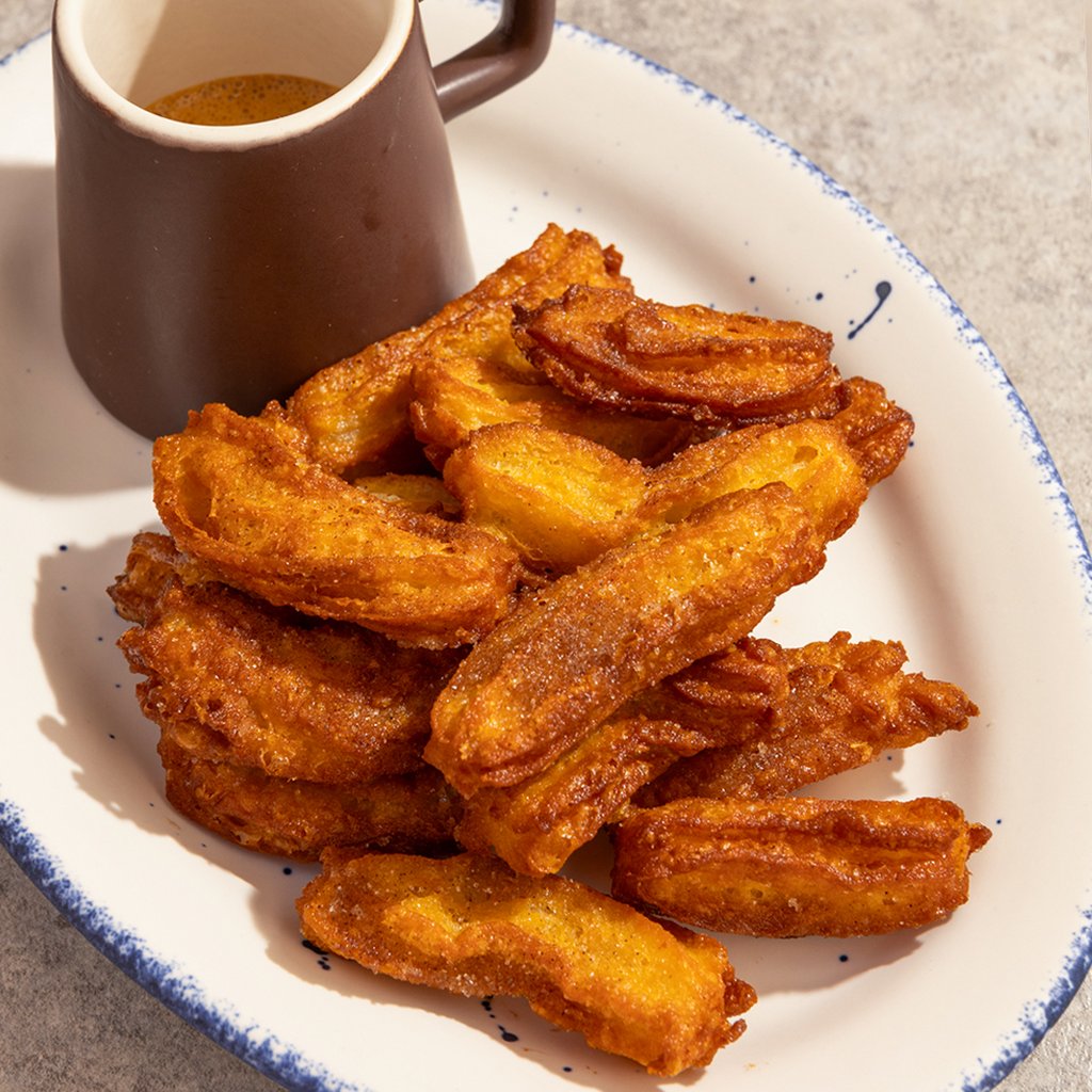 Churros azucarados con dulce de leche