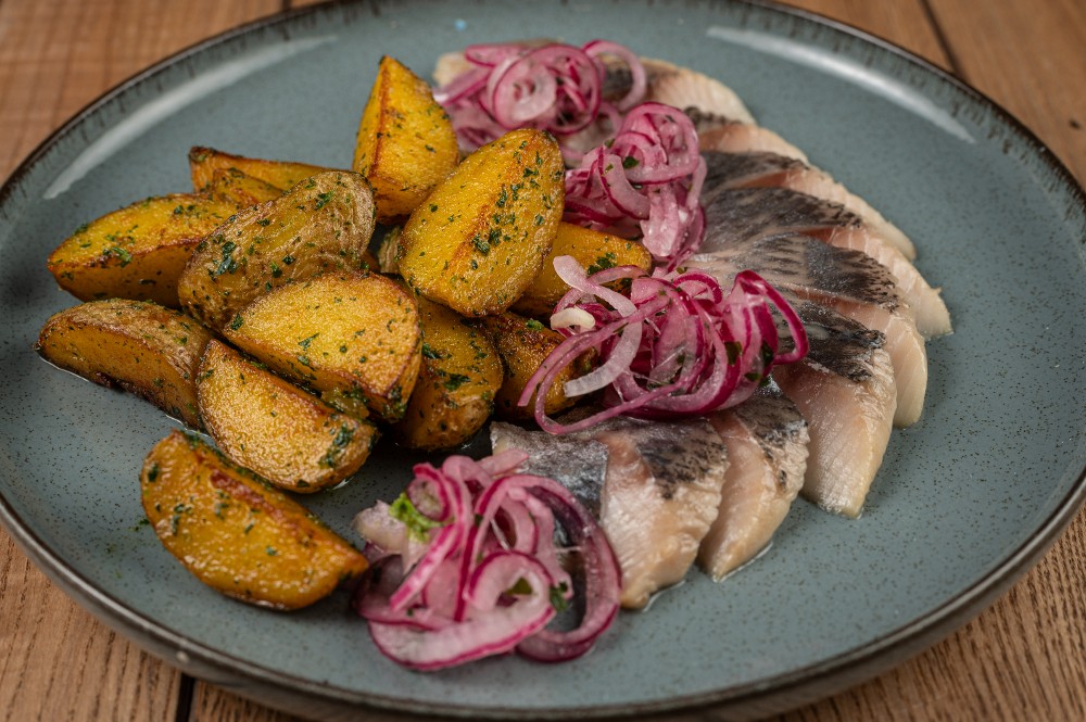 Картопля по-селянськи з оселедцем