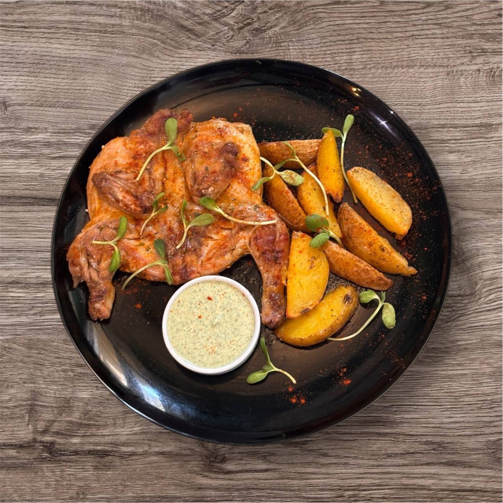 Запечене курча з картоплею 500г