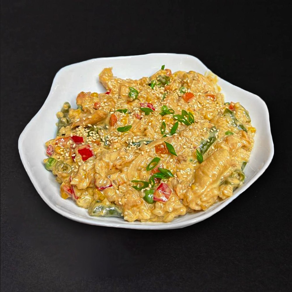 Рис з куркою у вершковому соусі