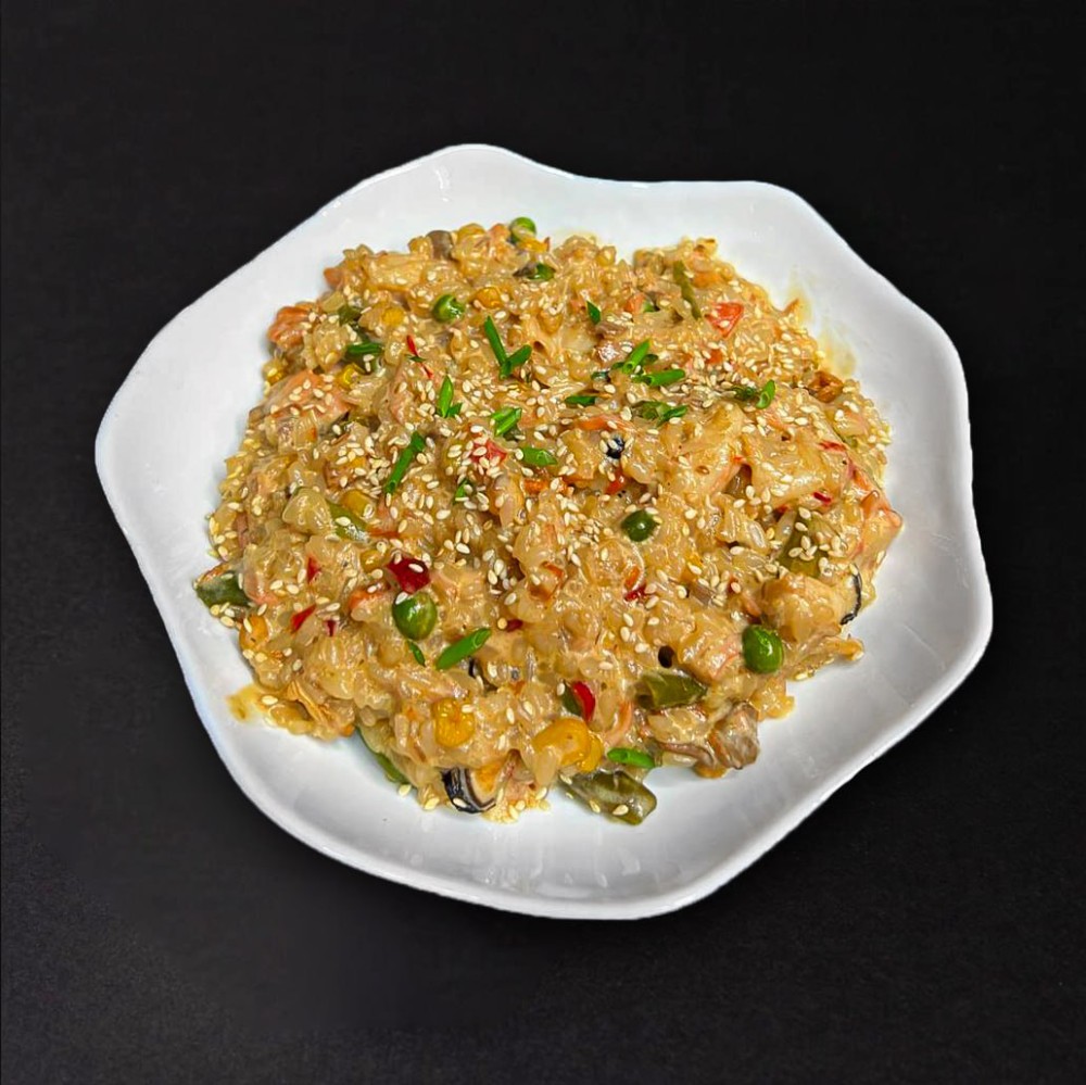 Рис з морепродуктами у вершковому соусі