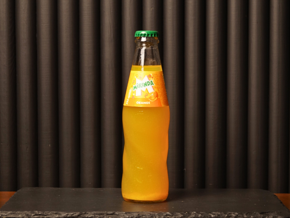 Напій "Mirinda" скло 0.25л.